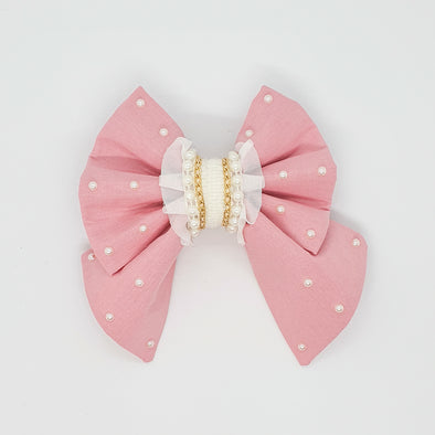 Pearl encrusted sailor bow in pink