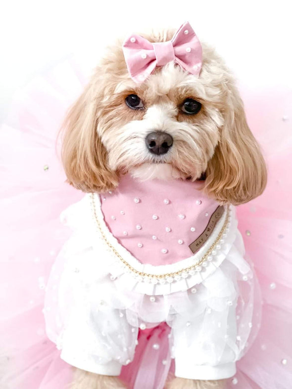 Cute dog wears handmade pink pearl bandana